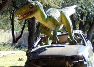 Velociraptor Smashing Car Dallas Zoo